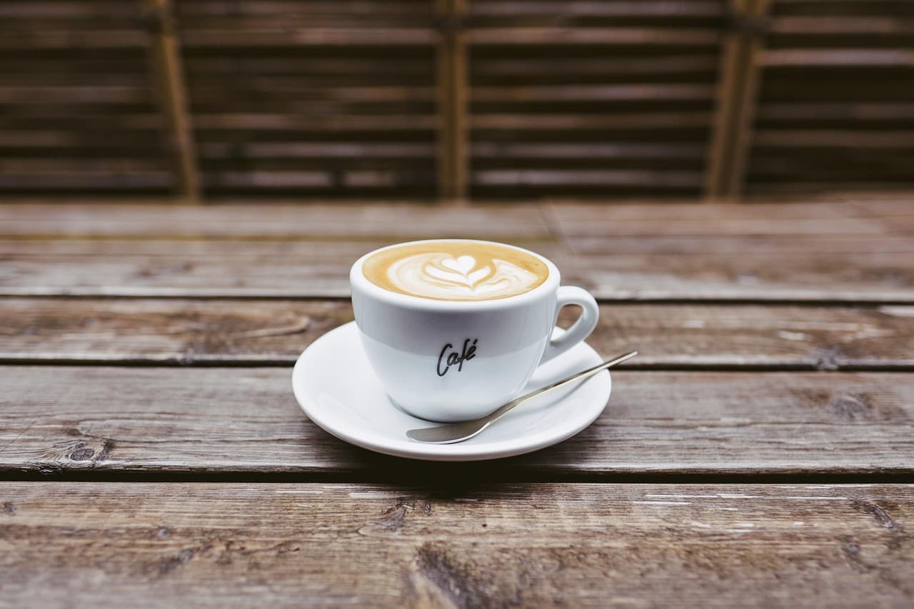 Cappuccino on a rustic wooden table